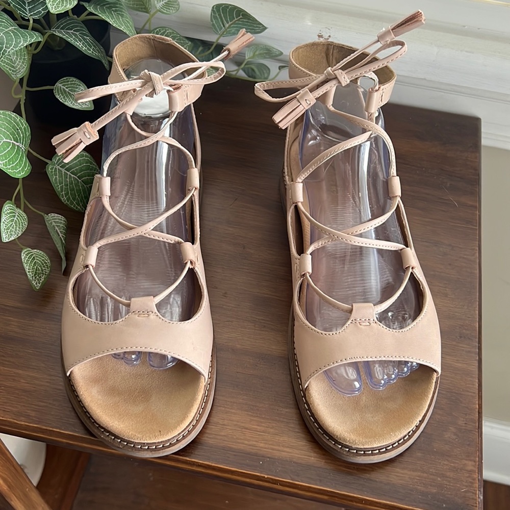 Clark’s Leather tie up sandals.  Only worn few times.